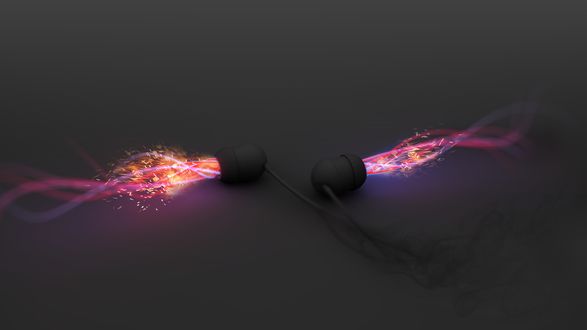 Обои на рабочий стол На столе лежат наушники из которых летят искры и разноцветный дым