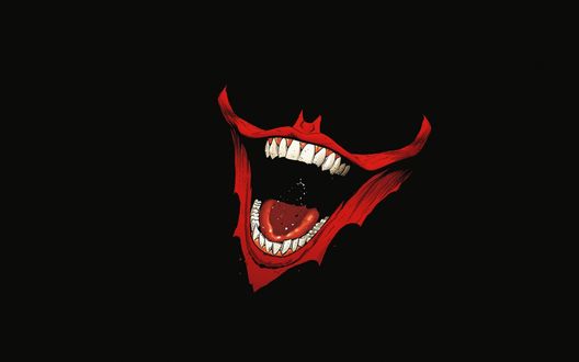 Обои на рабочий стол Улыбка Джокера / Joker на черном фоне