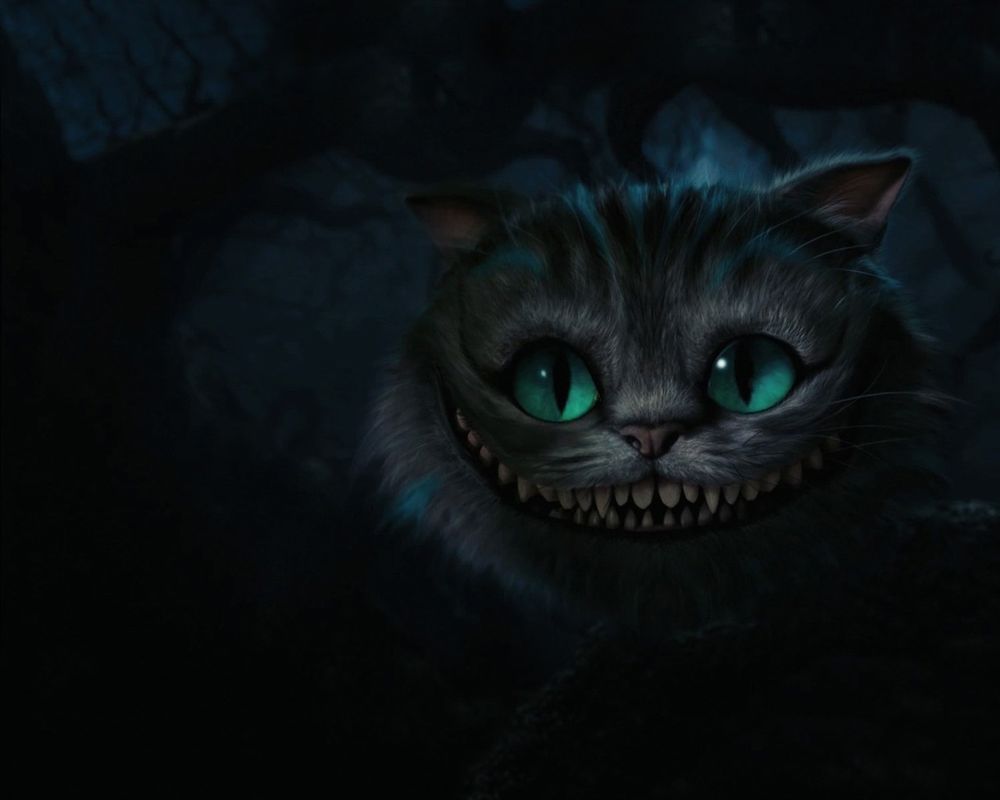 Обои для рабочего стола Чеширский кот / Cheshire Cat улыбается из темноты, из фильма Алиса в стране чудес / Alice in Wonderland