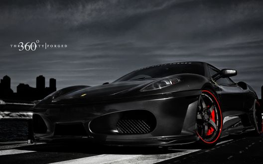 Обои на рабочий стол Феррари / Ferrari черного цвета на фоне вечернего неба
