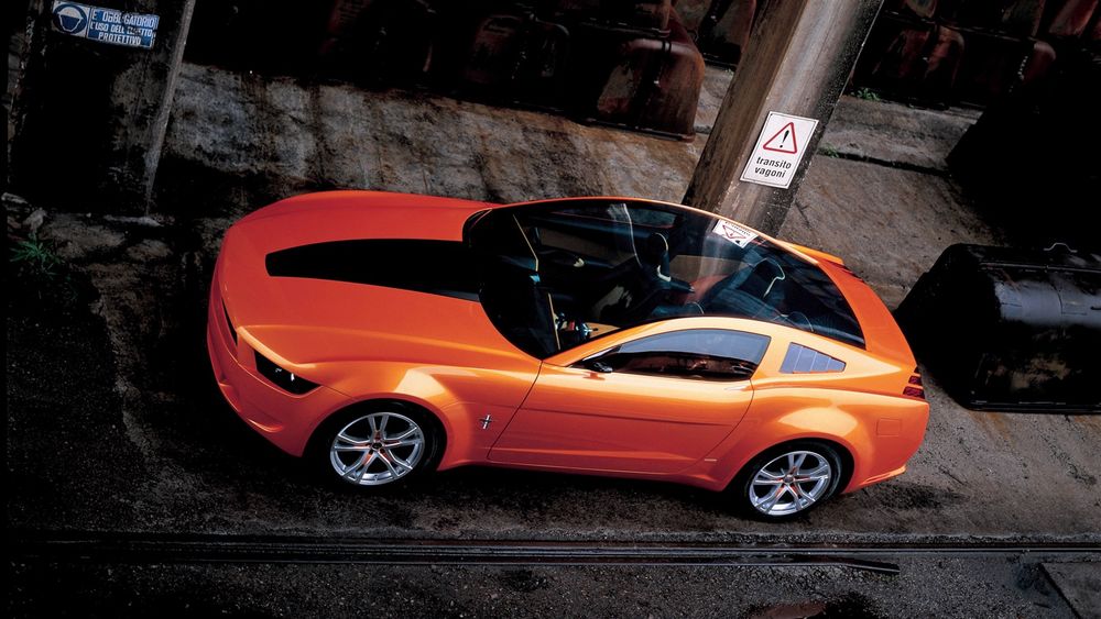 Обои для рабочего стола Автомобиль Ford Mustang Giugiaro / Форд Мустанг Джиджьяро оранжевого цвета