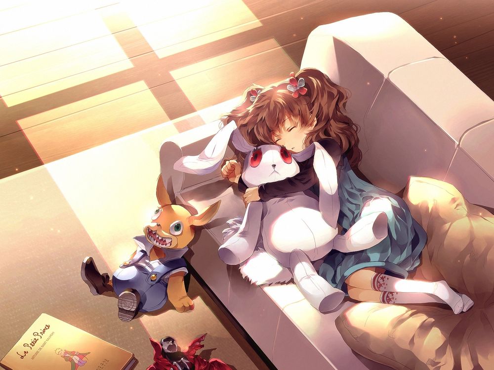Обои для рабочего стола Маленькая девочка спит на диване рядом с мягкой игрушкой зайцем
