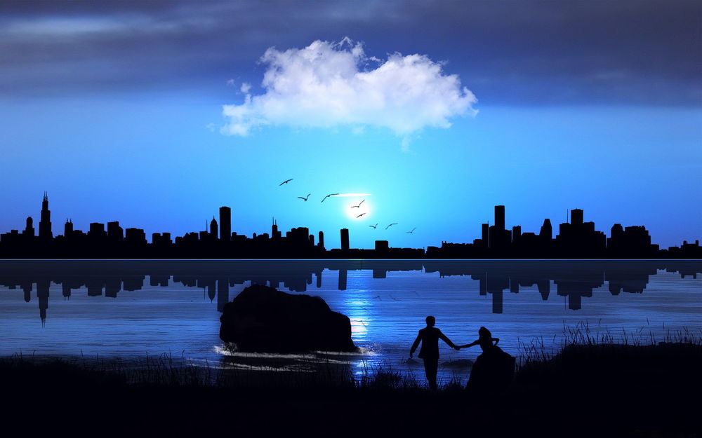 Обои для рабочего стола Мужчина и женщина, взявшись за руки, идут к водоему, на другом берегу которого видно очертание города, отразившееся в водной поверхности, на фоне вечернего неба с небольшим белым облаком, летящих птиц