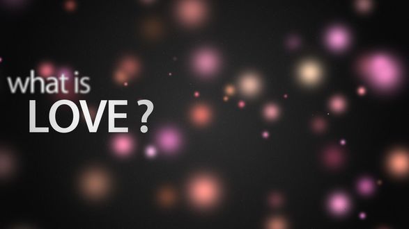 Обои на рабочий стол Текст на фоне цветных бликов (What is love? / Что такое любовь?)