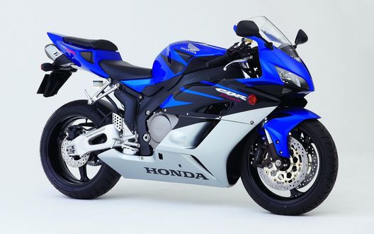 Обои на рабочий стол Мотоцикл Honda CBR-1000RR синего цвета на белом фоне
