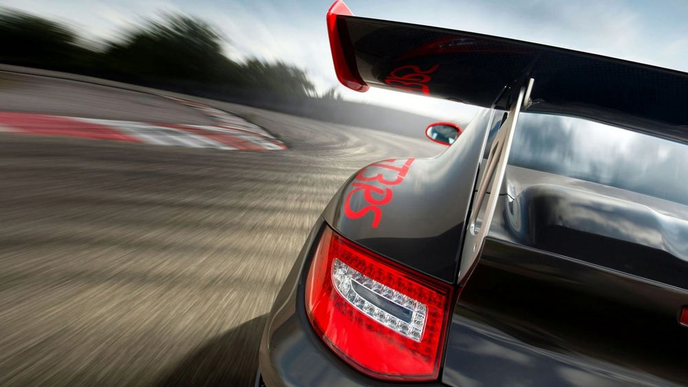 Обои для рабочего стола Porsche 911 GT3 RS / Порше 911 ГТЗ РС мчится по авто треку