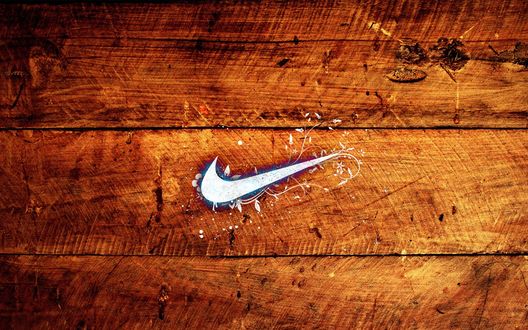 Обои на рабочий стол Стилизованная эмблема NIKE на фоне не струганных досок