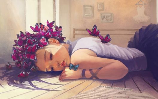 Обои на рабочий стол Девочка лежит на полу, на ее волосах сидят бабочки