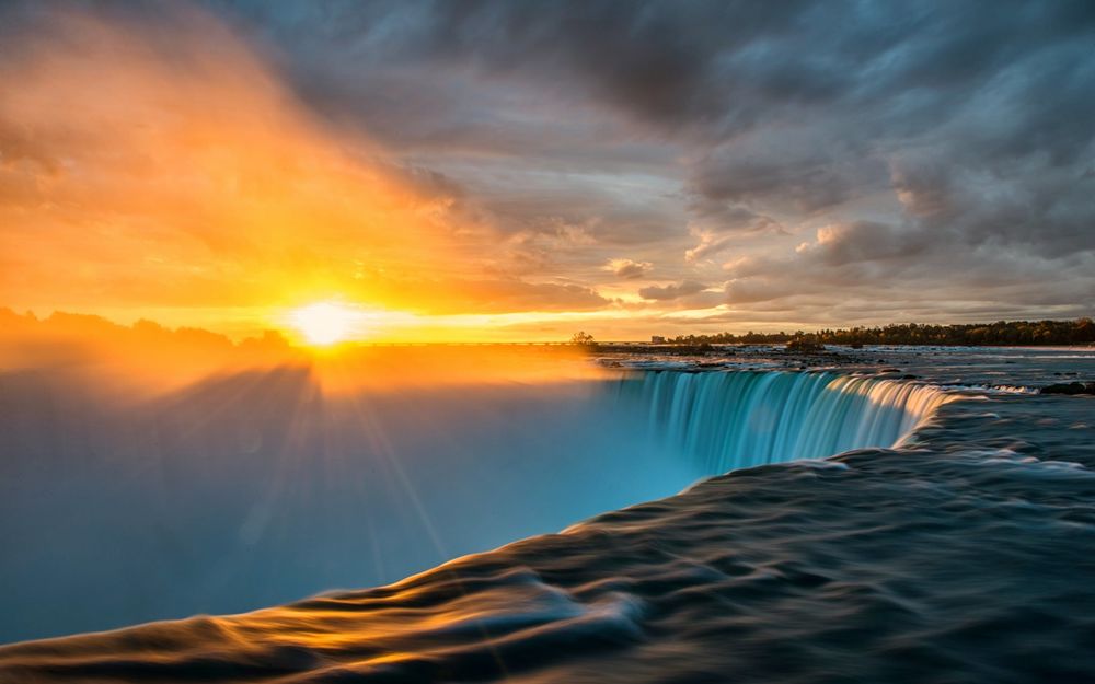 Обои для рабочего стола Ниагарский водопад на фоне захода солнца, США, Америка / Niagara Falls, USA, America