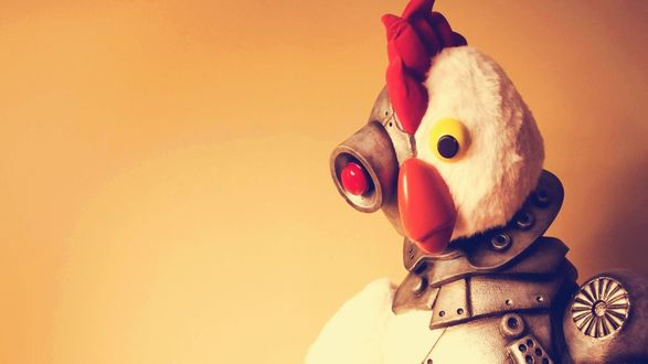 Обои на рабочий стол Робоцып, герой из пародийного американского мультсериала Robot Chicken на оранжевом фоне