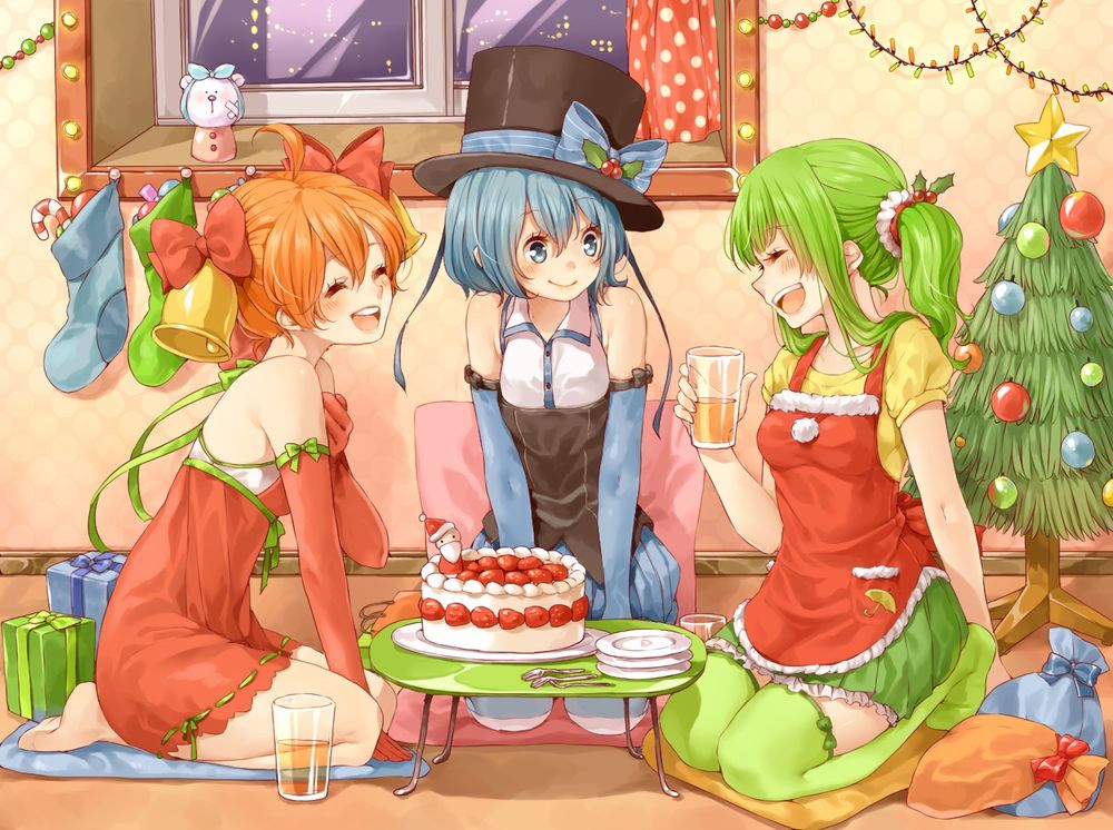 Обои для рабочего стола Три девушки сидят возле столика с тортом