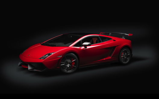 Обои на рабочий стол Красный Lamborghini Gallardo LP-570-4 2012, на черном фоне