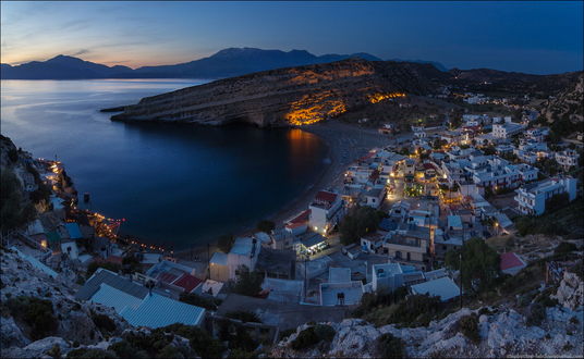 Обои на рабочий стол Городок Матала, остров Крит, Греция / Matala, Crete, Greece на фоне ночного неба, автор Sergey Stepanenko