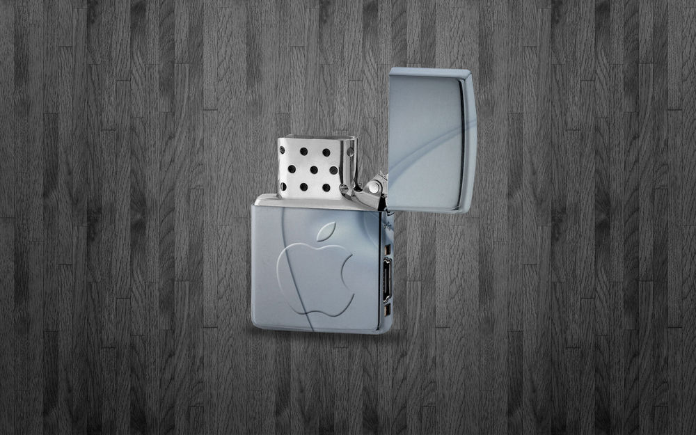 Обои для рабочего стола Плеер МР 3, в виде зажигалки ZIPPO с логотипом APPLE, стоит на сером ламинате, с текстурой дерева