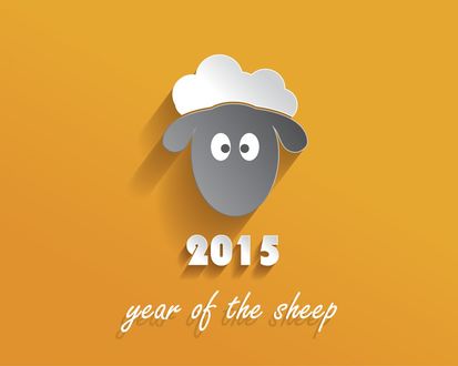 Обои на рабочий стол Лицо овечки на фоне слов 2015 year of the sheep / 2015 год овцы