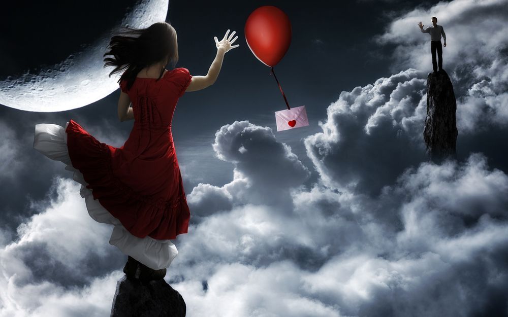 Обои для рабочего стола Почтовый шарик с привязанным к нему конвертом с сердечком, летит от девушки к мужчине, стоящих на скалах выше облаков, на фоне далекой планеты