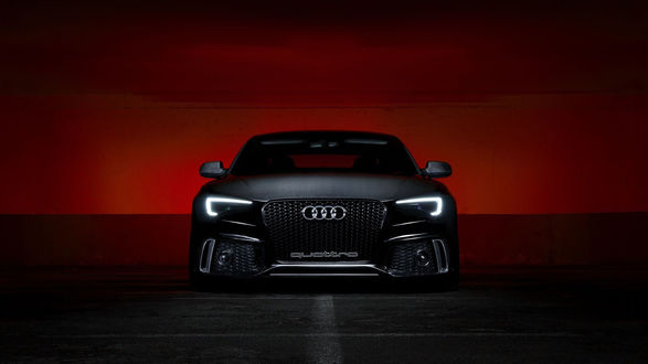 Обои на рабочий стол Автомобиль audi Quattro стоит с включенными фарами