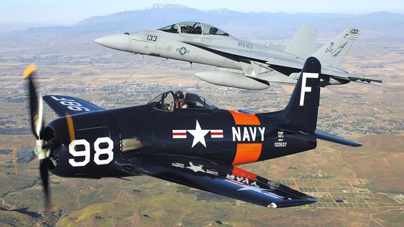 Обои на рабочий стол Раритетный истребитель F8F-1B ВВС США на фоне современного