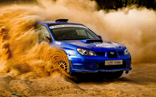 Обои на рабочий стол Субару Импреза WRX STi в клубах пыли