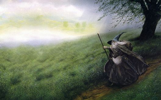 Обои на рабочий стол Гэндальф / Gandalf/ — один из центральных персонажей легендариума Джона Р. Р. Толкина, в частности, повести Хоббит, или Туда и обратно и романа Властелин Колец, идет по дороге