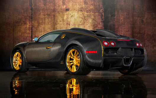 Обои на рабочий стол Карбоновый bugatti veyron с желтыми дисками (вид сбоку-сзади)