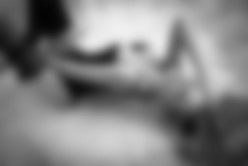 Обои для рабочего стола Девушка в нижнем белье и чулках лежит на ковре, разметав волосы и прикрыв глаза, by Lukasz Ratajak