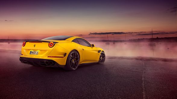 Обои на рабочий стол Желтая Ferrari California T стоит на берегу огромного озера, на котором находятся яхты, лодки, а вдалике виднеется лес