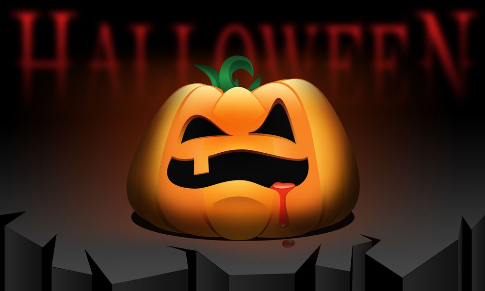 Обои для рабочего стола Из пасти страшной тыквы капает кровь (Halloween)