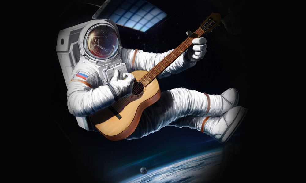 Обои для рабочего стола Космонавт с гитарой