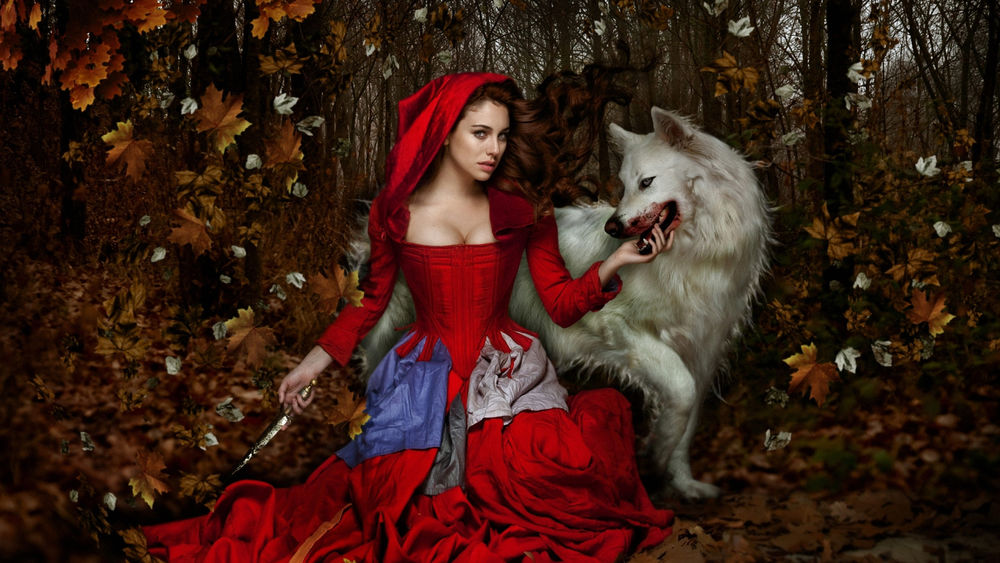 Обои для рабочего стола Девушка в красном и волк