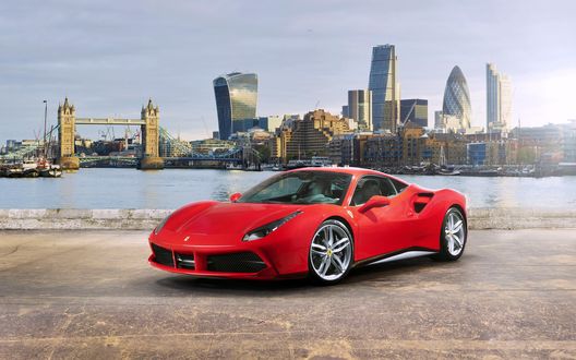 Обои на рабочий стол Красная ferrari 488 стоит на набережной