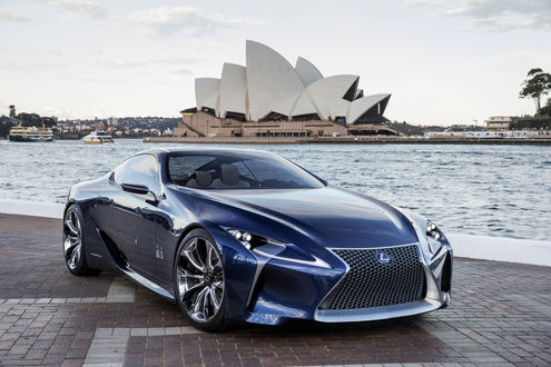 Обои на рабочий стол Lexus reveals hot 370kW hybrid coupe синего цвета, на набережной