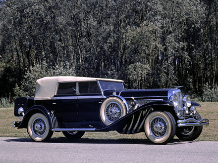 Обои на рабочий стол Автомобиль ретро тюнинг сбоку синий 1929 Duesenberg J 355 2225 Convertible Sedan SWB (Murphy) на дороге на фоне лесного массива