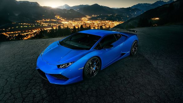 Обои на рабочий стол Суперкар, Novitec Torado, тюнинг, 2015, Lamborghini Huracan, N-Largo, Ламборгини Хуракан, голубой на фоне прекрасной панорамы ночного города