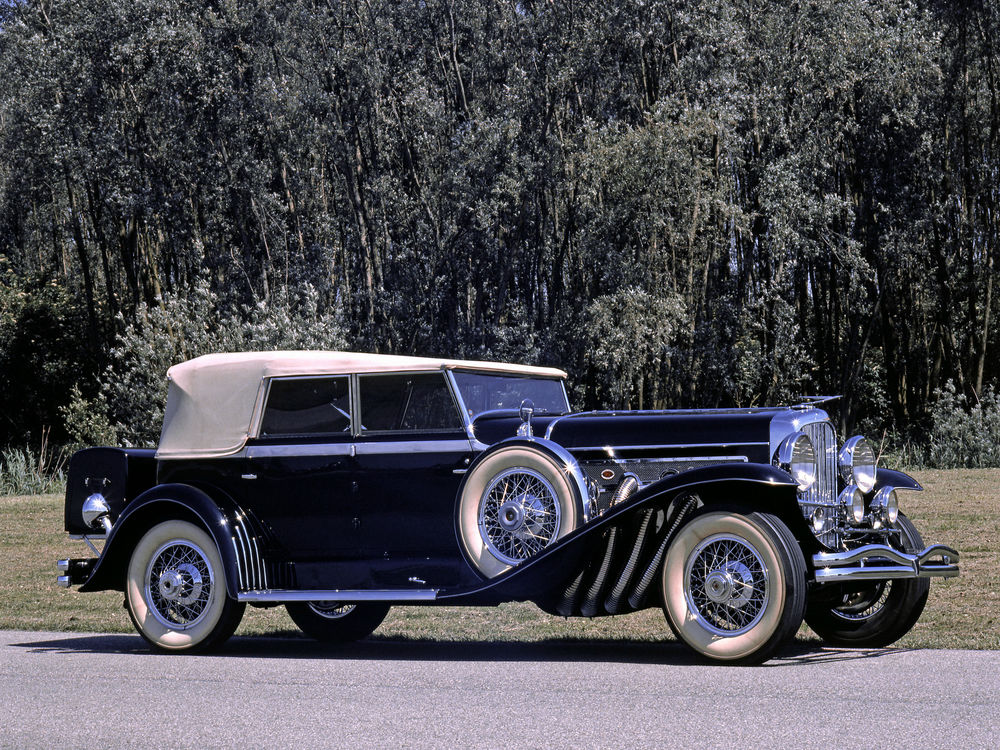 Обои для рабочего стола Автомобиль ретро тюнинг сбоку синий 1929 Duesenberg J 355 2225 Convertible Sedan SWB (Murphy) на дороге на фоне лесного массива