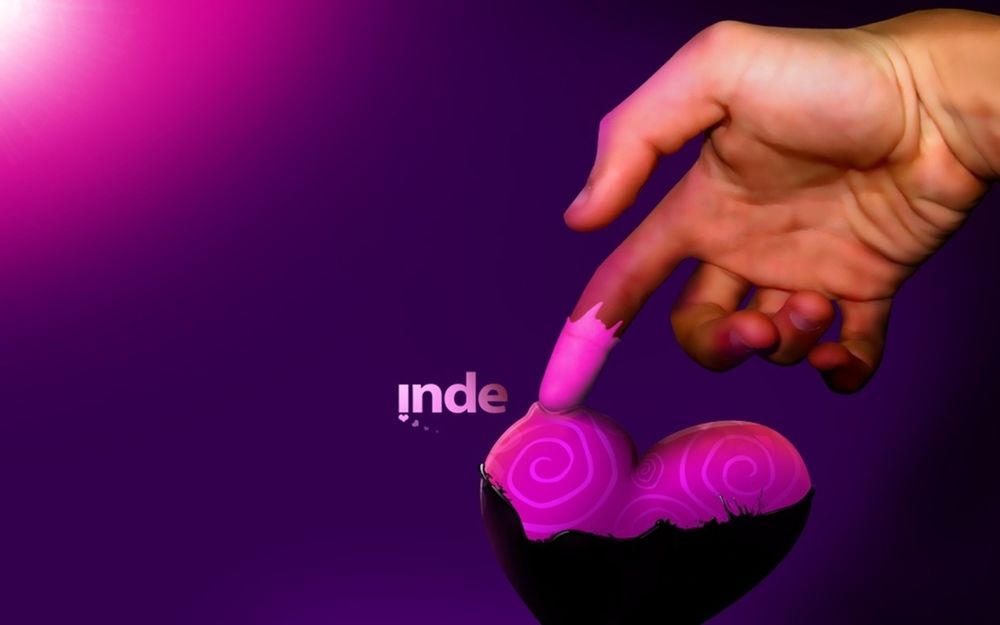Обои для рабочего стола Рука с розовым пальцем, касающимся сердца (Inde)