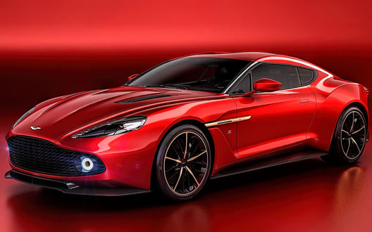 Обои на рабочий стол Автомобиль Aston Martin Vanquish, красный, увидел мир в 2000 году. Второе представление автомобиля состоялось только в 2012 году