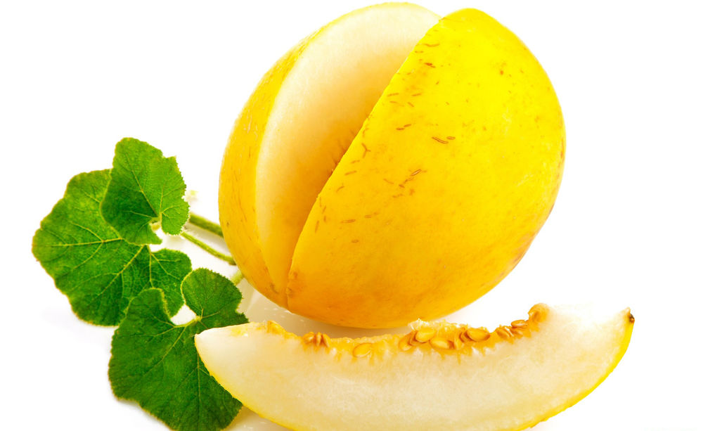 Обои для рабочего стола Желтая дыня с отрезанной долькой