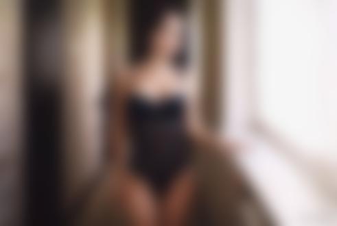 Обои для рабочего стола Модель Angelina Petrova / Ангелина Петрова в черном боди стоит у окна, глядя на улицу, by Denis Petrov