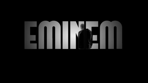 Обои на рабочий стол Надпись Eminem и сам рэпер на черном фоне