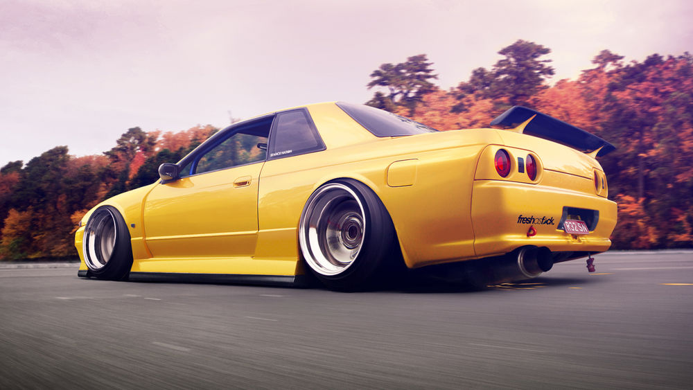 Обои для рабочего стола Автомобиль Nissan Skyline R32 желтого цвета