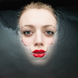 Обои на рабочий стол Лицо девушки на поверхности воды, by Marc Lamey