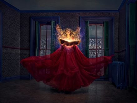Обои на рабочий стол Девушка в красном платье с открытой книгой со свечением стоит посреди комнаты, фотограф Robert Cornelius