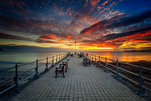 Обои на рабочий стол Причал с лавочками, уходящий в цветные облака, by The Narratographer