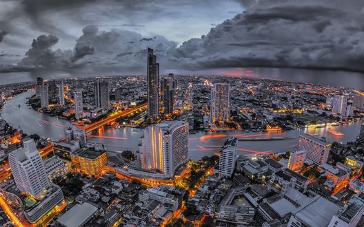 Обои на рабочий стол Панорама города с небоскребами, в серо-пепельных тонах и светящихся огнях