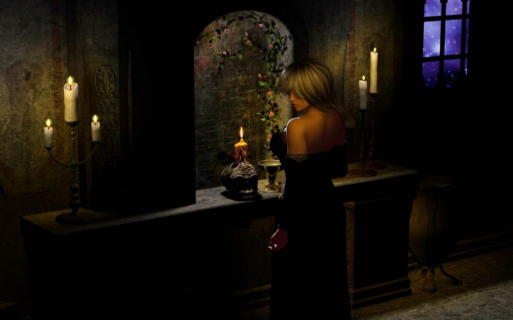Обои для рабочего стола Светловолосая девушка в черном платье стоит в полутьме перед черепом на подставке, рядом зажженные канделябры, в стороне окно, за которым виднеется призрачный синий свет