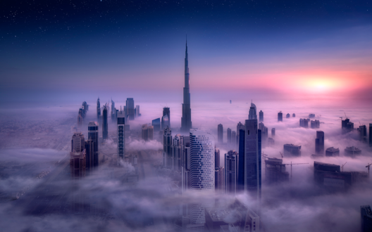 Обои на рабочий стол Вид на небоскребы Dubay / Дубая, Объединенные Арабские Эмираты в тумане с высоты
