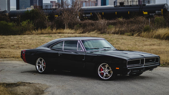Обои на рабочий стол Dodge Charger 1969 возле здания