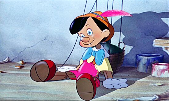 Обои на рабочий стол Pinocchio / Пиноккио сидит на полу, мультфильм Пиноккио студии Disney / Уолта Диснея