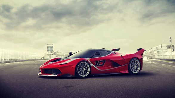 Обои на рабочий стол Суперкар Ferrari FXX в аэропорту